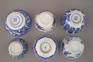 A collection of mostly blue and white Chinese porcelain plates, cups and saucers, 18/19th C.