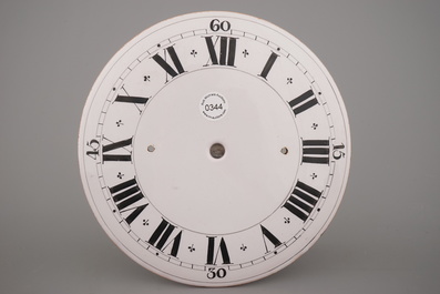 A rare English Delft clock face dial, 18th C.