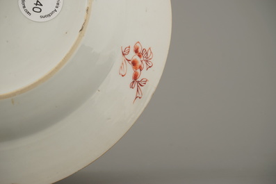 A Chinese porcelain Kakiemon style plate, Qianlong, 18th C.