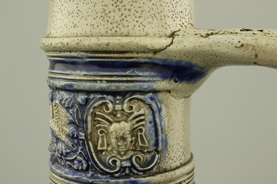 A Westerwald jug, decorated with historical panels, early 17th C.