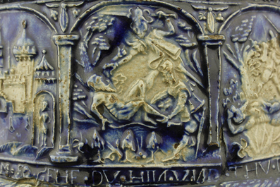 A Westerwald jug, decorated with historical panels, early 17th C.