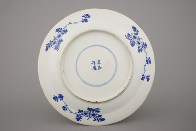 Two Chinese porcelain blue and white plates and three bowls, Kangxi and late Qing dynasty