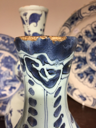 A Dutch Delft blue and white chinoiserie Wan-Li style bottle vase, 17th C.