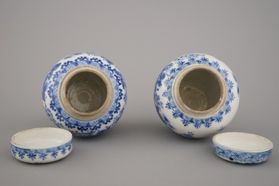 A pair of Japanese porcelain blue and white Arita jars and covers, 19th C.
