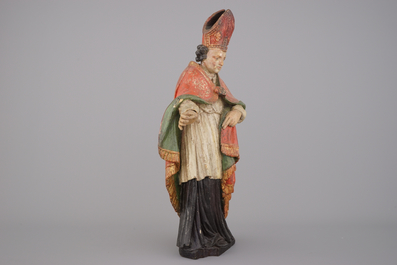 A polychrome carved wood figure of a bishop, 18th C.