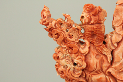 A fine Chinese red coral sculpted group of Guanyin playing the Qin, 19th C.