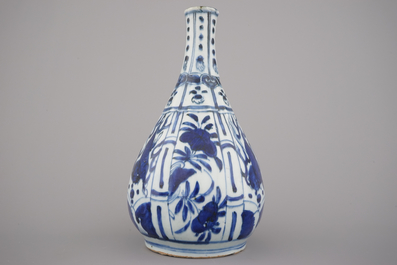 A Chinese blue and white Ming dynasty Wan-Li bottle with horses, 16th C.