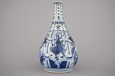 A Chinese blue and white Ming dynasty Wan-Li bottle with horses, 16th C.