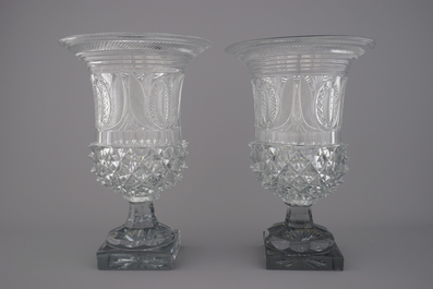 A pair of large cut glass urns on stand, probably Voneche, early 19th C.