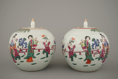 A pair of Chinese porcelain famille rose jars and covers, 19th C.
