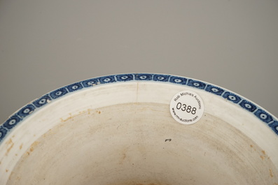 A Chinese porcelain blue and white jardiniere on stand, Qing dynasty