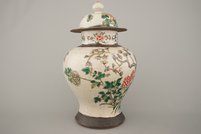 A Chinese porcelain famille verte Nanking vase and cover, 19th C.