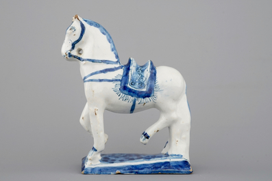 A fine Dutch Delft blue and white model of a standing horse, 18th C.