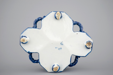 An exceptionally extensive Dutch Delft blue and white cruet set, 18th C.