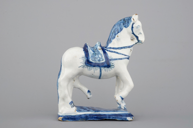 A fine Dutch Delft blue and white model of a standing horse, 18th C.