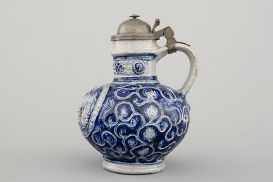 A fine Westerwald stoneware pewter-mounted jug with the coat of arms of France, dated 1597
