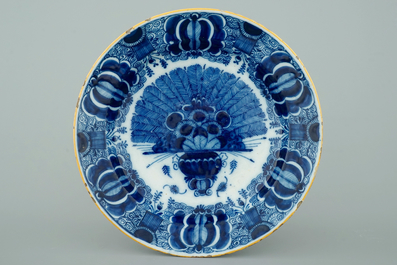 Two pairs of Dutch Delft blue and white peacock tail's plates, 18th C.