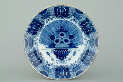 Two pairs of Dutch Delft blue and white peacock tail's plates, 18th C.