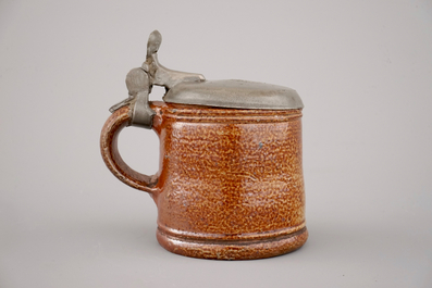 A rare Raeren tiger salt glaze pewter-mounted jug, ca. 1600
