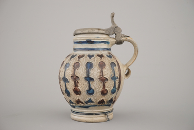 A manganese and blue Westerwald pewter-mounted globular jug, 17th C.