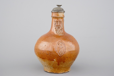 A fine beardman's or bellarmine jug with pewter cover, Raeren, late 16th C.