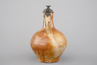 A fine beardman's or bellarmine jug with pewter cover, Raeren, late 16th C.