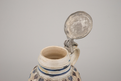 A manganese and blue Westerwald pewter-mounted globular jug, 17th C.