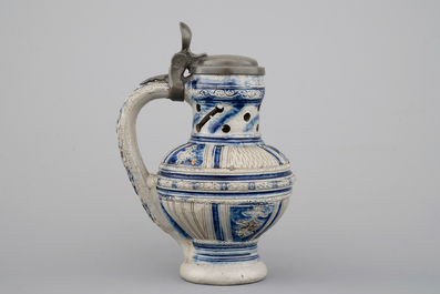 A rare Westerwald pewter-mounted puzzle or spill jug, 17th C.