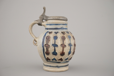 A manganese and blue Westerwald pewter-mounted globular jug, 17th C.