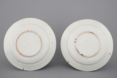 A pair of Brussels faience plates with flower vases, 18th C.