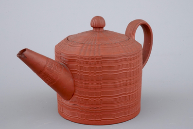 A Staffordshire redware teapot and cover, 18th C.