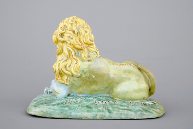 An important Brussels faience figure of a lion, 18th C.