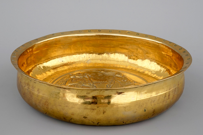 A large Nuremberg brass alms bowl showing &quot;The Annunciation, 16th C.