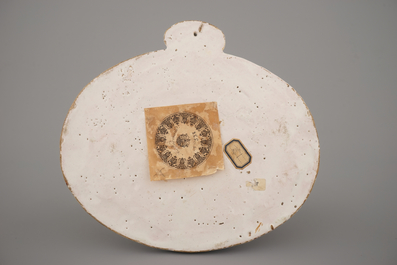 A Dutch Delft black-enhanced oval plaque with chinoiserie, ca. 1800