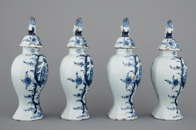 A set of 4 fine Dutch Delft blue and white vases with hunting scenes, 18th C.