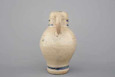 Two globular Westerwald stoneware jugs in blue and incised, one with pewter lid, 17th C.