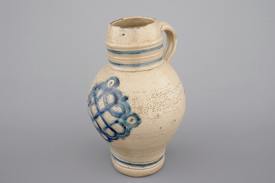 Two globular Westerwald stoneware jugs in blue and incised, one with pewter lid, 17th C.