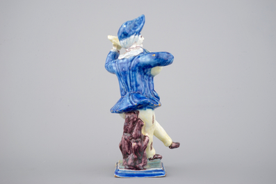 A French faience figure of a violin player, ca. 1800