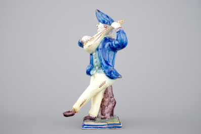 A French faience figure of a violin player, ca. 1800