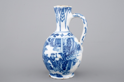 A Dutch Delft blue and white chinoiserie jug, 17th C.