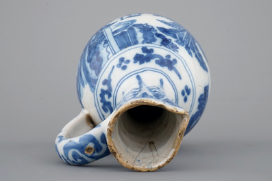 A Dutch Delft blue and white chinoiserie jug, 17th C.