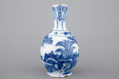 A Dutch Delft blue and white chinoiserie jug, 17th C.