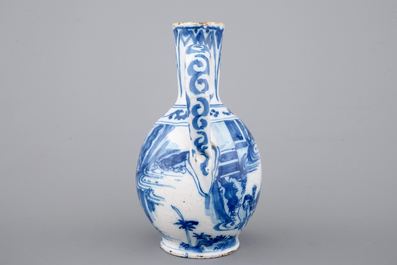 A Dutch Delft blue and white chinoiserie jug, 17th C.