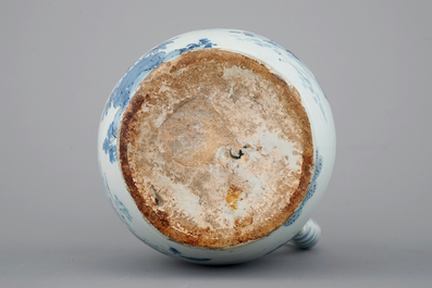 A Dutch Delft blue and white chinoiserie jug, 17th C.