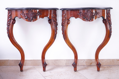 A fine pair of carved wood wall console tables, 19th C.