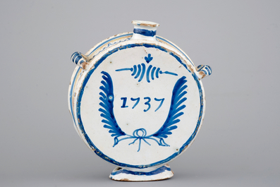 A French faience pilgrim's flask with St.-Francis, Nevers, 18th C.