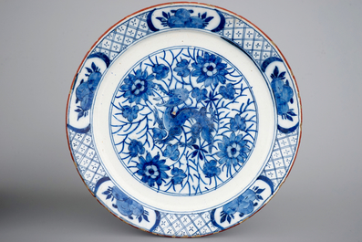 A pair of Dutch Delft blue and white plates with a chinoiserie design of dragons, 18th C.