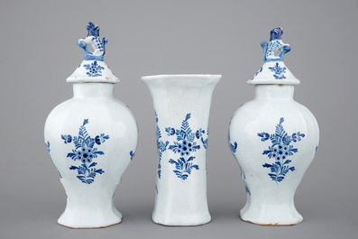 A blue and white Dutch Delft three-piece chinoiserie garniture, 19th C.