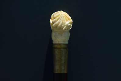 A Chinese carved ivory and wood walking stick or cane with a dragon's head, 19th C.