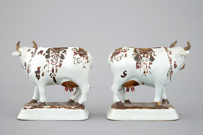 A pair of white Delft cold-painted cows, Dutch, 18th C.